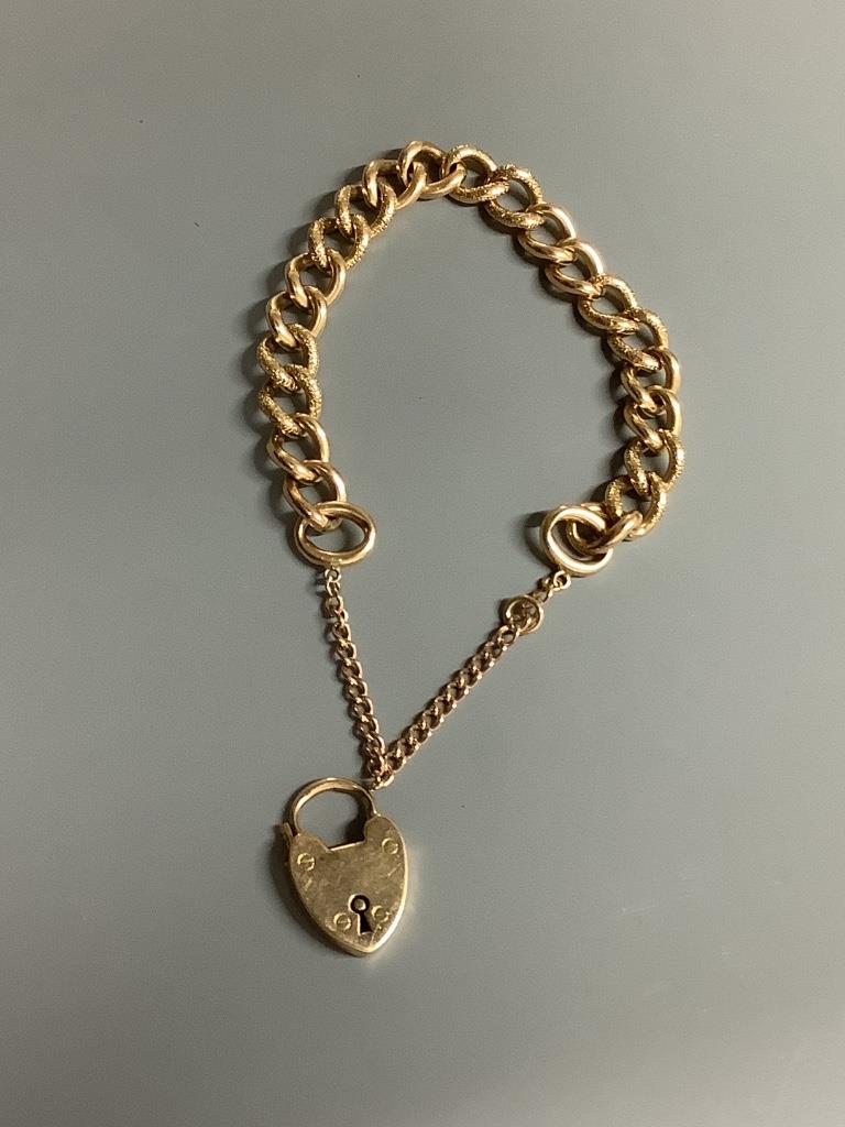 A 15ct gold curb-link bracelet with padlock clasp, 41g